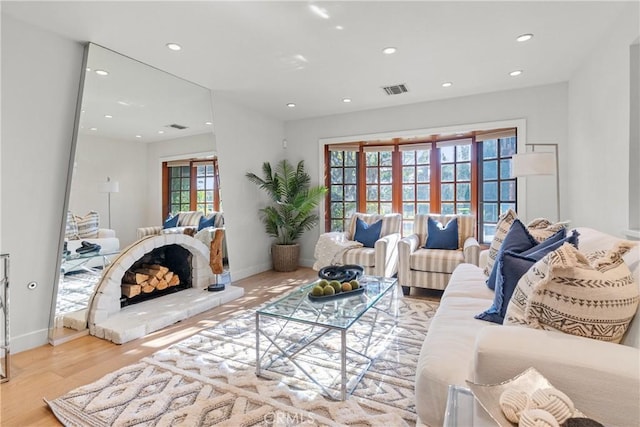 5144 Meadow Wood Ave, Lakewood, CA 90712 - living area with wood finished floors and recessed lighting