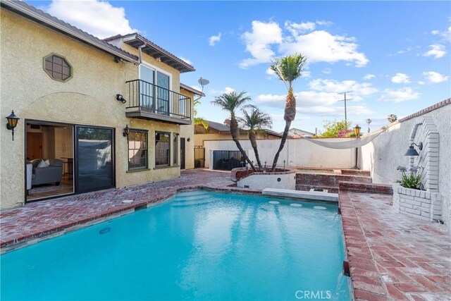 5144 Meadow Wood Ave, Lakewood, CA 90712 - view of pool featuring a fenced backyard and a patio area