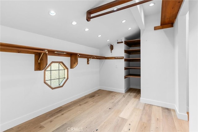 5144 Meadow Wood Ave, Lakewood, CA 90712 - walk in closet with light wood finished floors and vaulted ceiling