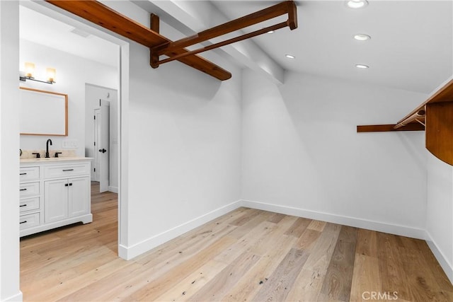 5144 Meadow Wood Ave, Lakewood, CA 90712 - spacious closet featuring light wood-type flooring and lofted ceiling