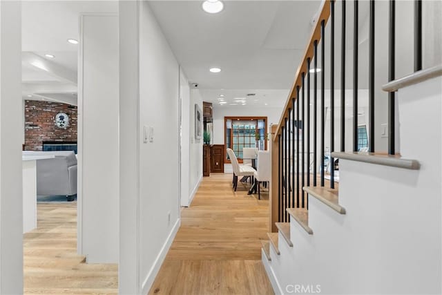 5144 Meadow Wood Ave, Lakewood, CA 90712 - hall featuring stairway, wood finished floors, and recessed lighting