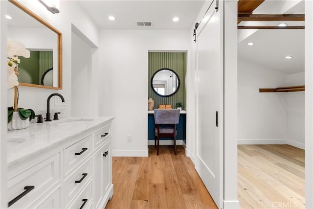 5144 Meadow Wood Ave, Lakewood, CA 90712 - full bath featuring double vanity, wood finished floors, and recessed lighting