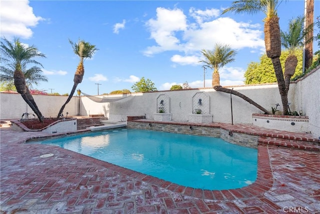 5144 Meadow Wood Ave, Lakewood, CA 90712 - view of pool featuring a patio and a fenced backyard