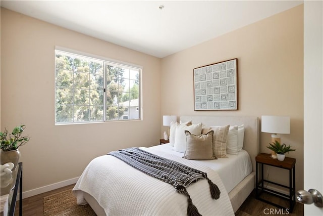 6375 Woodrow Ct Unit 3, Chino Hills, CA 91709 - bedroom with wood finished floors and baseboards