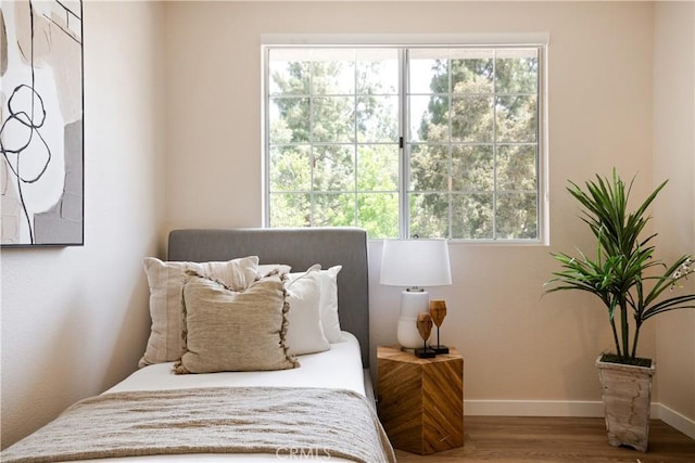 6375 Woodrow Ct Unit 3, Chino Hills, CA 91709 - bedroom featuring wood finished floors, baseboards, and multiple windows