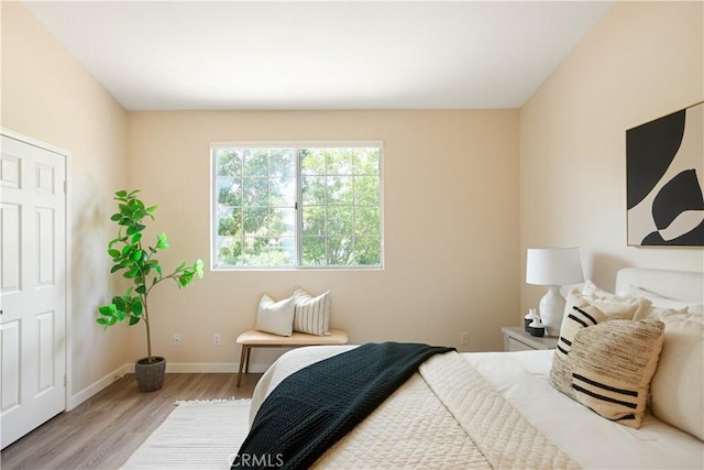 6375 Woodrow Ct Unit 3, Chino Hills, CA 91709 - bedroom featuring wood finished floors and baseboards