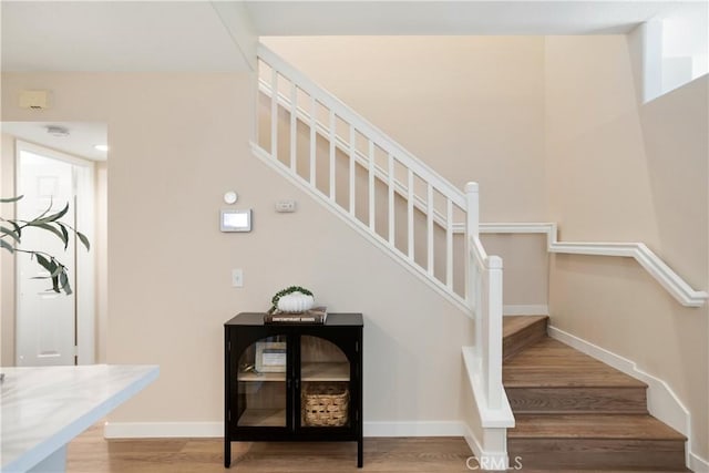 6375 Woodrow Ct Unit 3, Chino Hills, CA 91709 - staircase with wood finished floors and baseboards