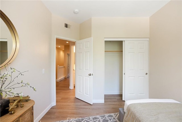 6375 Woodrow Ct Unit 3, Chino Hills, CA 91709 - bedroom featuring light wood-style floors, baseboards, and a closet