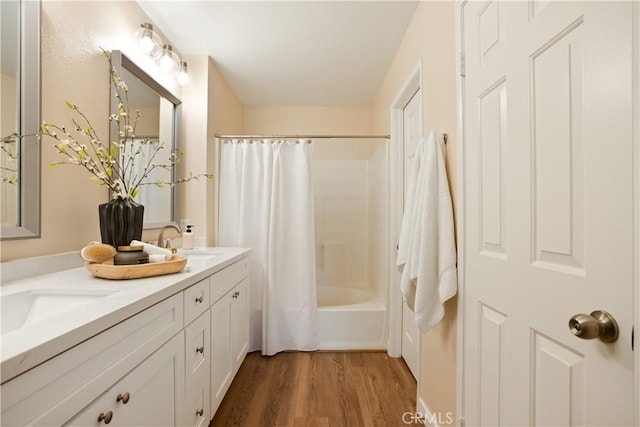 6375 Woodrow Ct Unit 3, Chino Hills, CA 91709 - full bath featuring double vanity, wood finished floors, and shower / bath combo with shower curtain