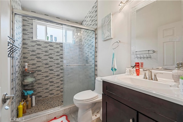 2350 Robert Rd, Rowland Heights, CA 91748 - bathroom featuring toilet, a shower stall, and vanity