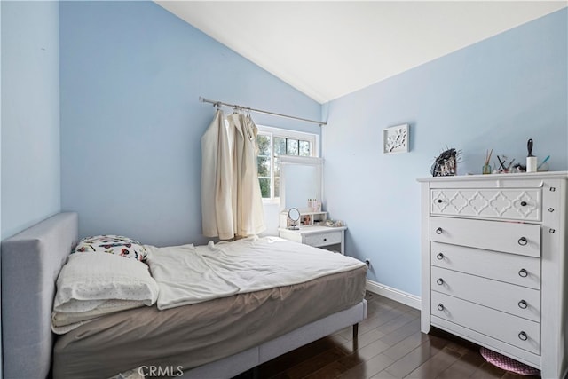 2350 Robert Rd, Rowland Heights, CA 91748 - bedroom with vaulted ceiling, dark wood-style floors, and baseboards