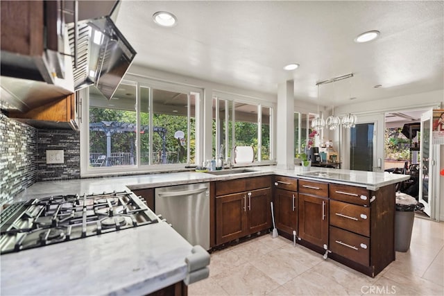 2350 Robert Rd, Rowland Heights, CA 91748 - kitchen featuring stainless steel dishwasher, a sink, healthy amount of natural light, tasteful backsplash, and recessed lighting