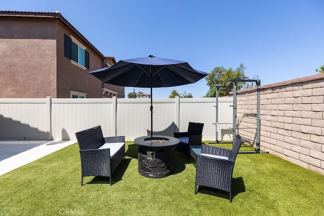 24802 Sandy Trail Pl, Menifee, CA 92584 - fenced backyard featuring a fire pit