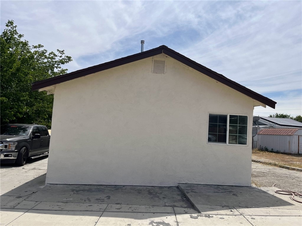 322 S 8th St, Taft, CA 93268 - view of property exterior featuring stucco siding