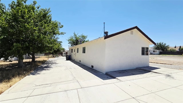 322 S 8th St, Taft, CA 93268 - view of home's exterior featuring stucco siding