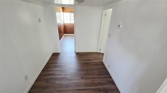 322 S 8th St, Taft, CA 93268 - hallway with dark wood-style flooring and baseboards