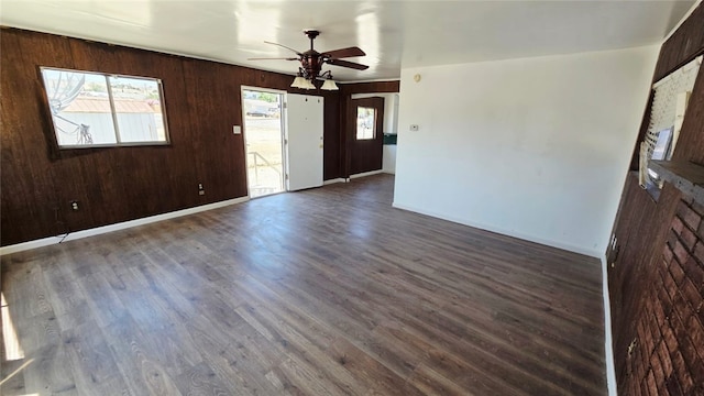 322 S 8th St, Taft, CA 93268 - unfurnished living room featuring ceiling fan and wood finished floors