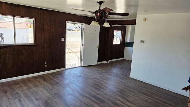322 S 8th St, Taft, CA 93268 - foyer entrance with a ceiling fan, wood finished floors, and wooden walls