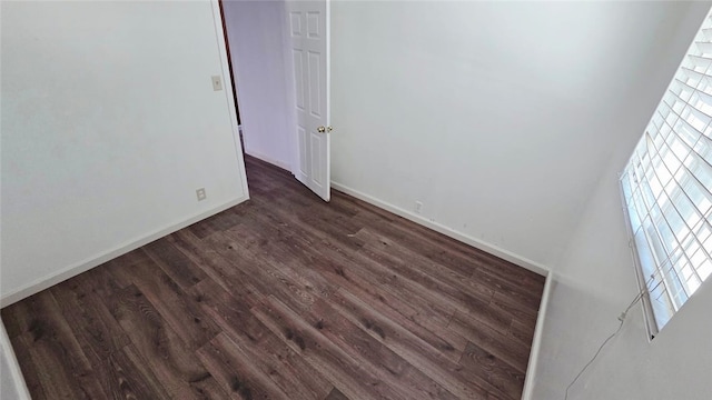 322 S 8th St, Taft, CA 93268 - unfurnished room with dark wood-type flooring and baseboards