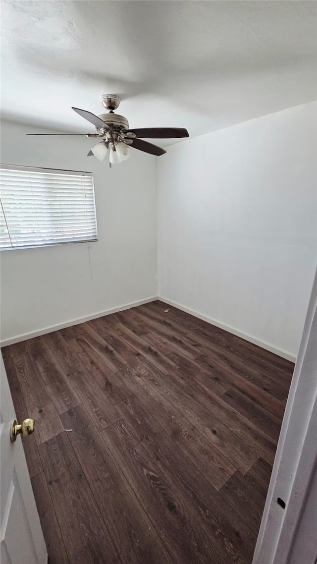322 S 8th St, Taft, CA 93268 - empty room with dark wood-style flooring and a ceiling fan
