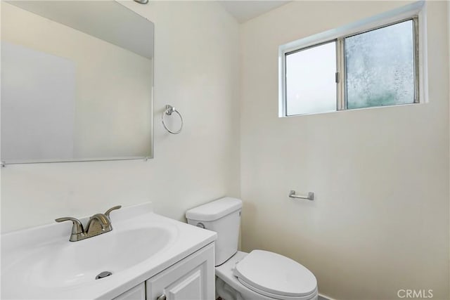 20235 Cohasset St Unit 6, Winnetka, CA 91306 - half bathroom featuring toilet and vanity