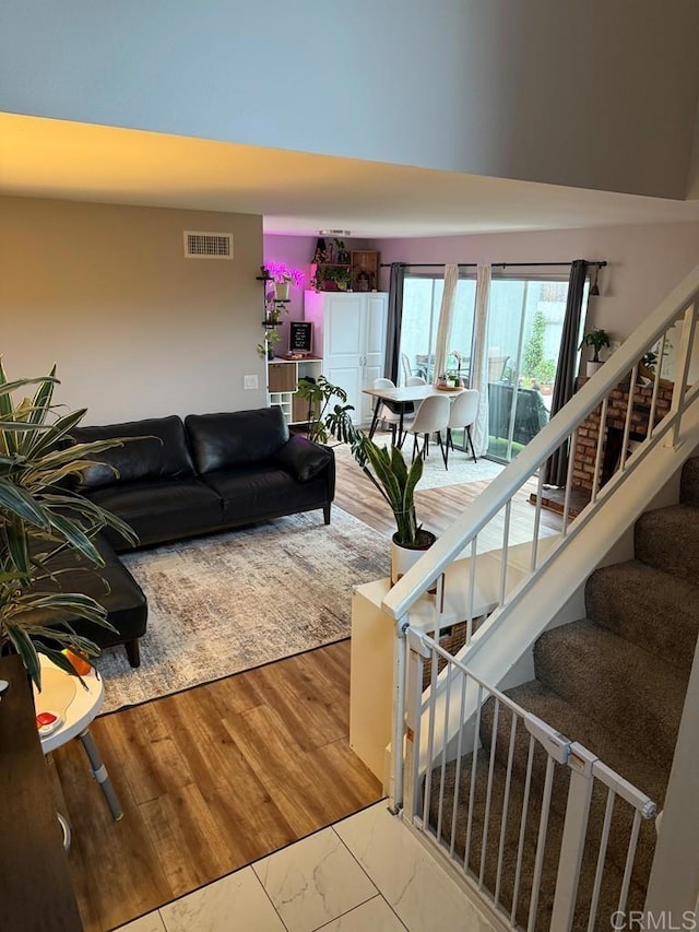 25675 Via Del Rey, San Juan Capistrano, CA 92675 - living room featuring stairway, marble look tile flooring, and a high ceiling