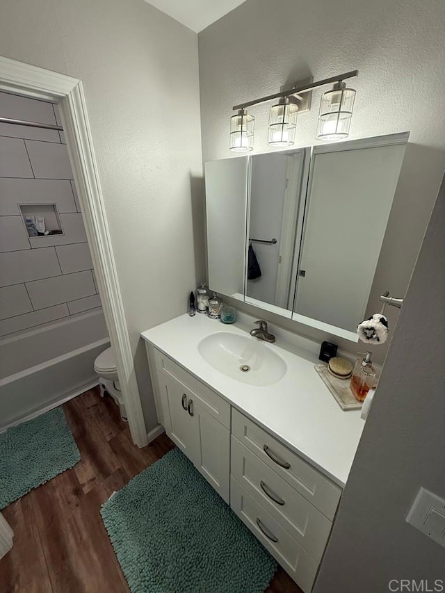 25675 Via Del Rey, San Juan Capistrano, CA 92675 - full bathroom with vanity, wood finished floors, and toilet