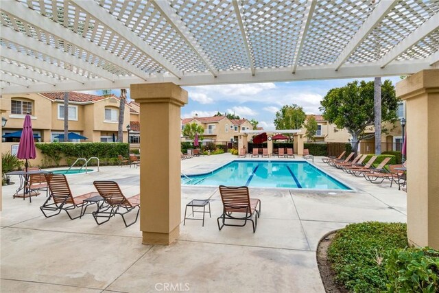 2444 Paseo Circulo, Tustin, CA 92782 - community pool featuring a pergola, a residential view, and a patio