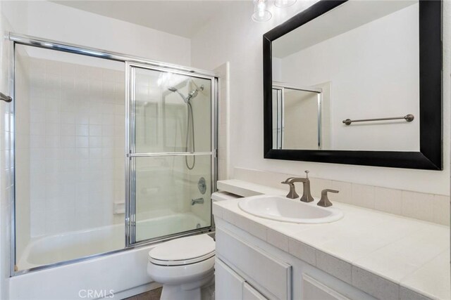 2444 Paseo Circulo, Tustin, CA 92782 - bathroom with vanity, toilet, and shower / bath combination with glass door