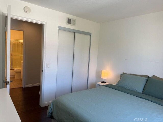 2444 Paseo Circulo, Tustin, CA 92782 - bedroom featuring dark wood-style floors and a closet