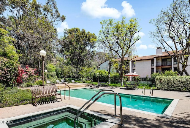 4210 Via Arbolada Unit 308, Los Angeles, CA 90042 - community pool with a community hot tub and a patio