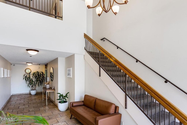 4210 Via Arbolada Unit 308, Los Angeles, CA 90042 - staircase featuring a chandelier