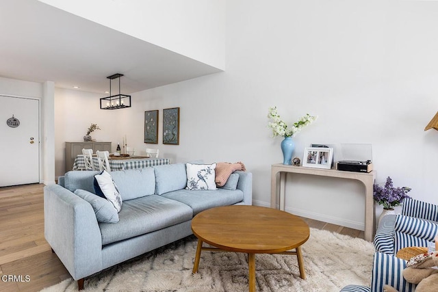 4210 Via Arbolada Unit 308, Los Angeles, CA 90042 - living room with wood finished floors, baseboards, and recessed lighting