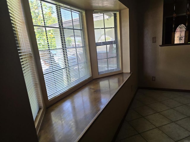 704 S H St, Imperial, CA 92251 - unfurnished dining area featuring tile patterned flooring and baseboards