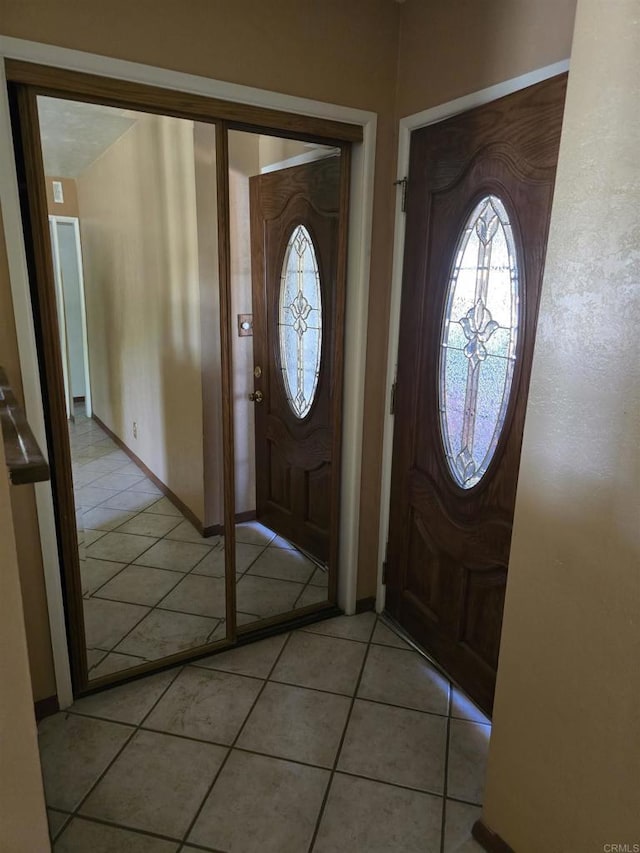 704 S H St, Imperial, CA 92251 - foyer entrance featuring light tile patterned floors and baseboards