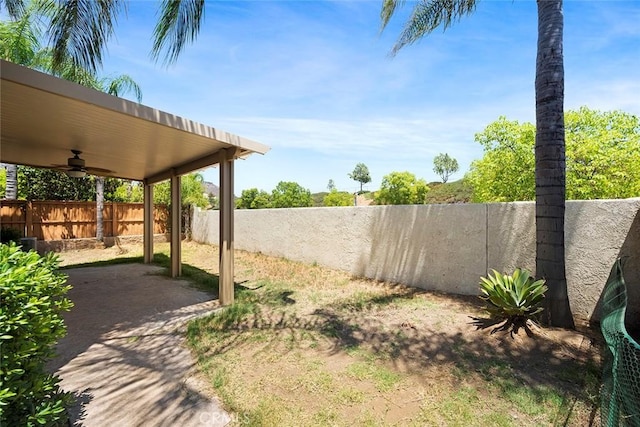 39766 Pinedale Way, Murrieta, CA 92562 - fenced backyard with a ceiling fan and a patio