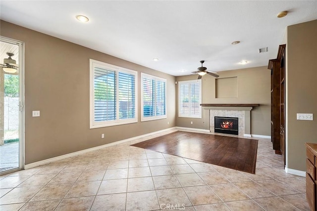39766 Pinedale Way, Murrieta, CA 92562 - unfurnished living room with a ceiling fan, light tile patterned floors, a tile fireplace, and recessed lighting