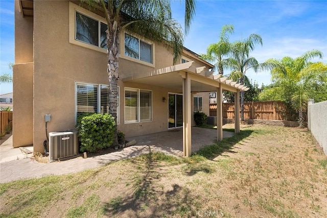 39766 Pinedale Way, Murrieta, CA 92562 - back of property with stucco siding, a patio area, and a fenced backyard