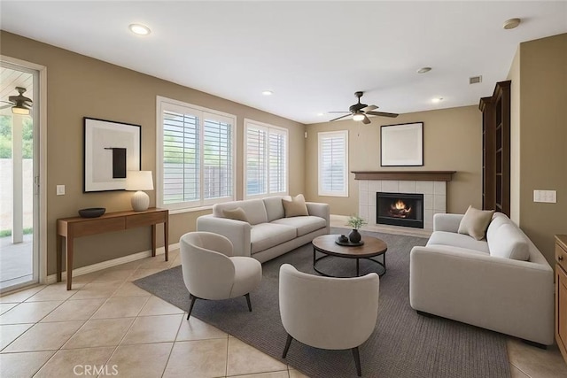 39766 Pinedale Way, Murrieta, CA 92562 - living area featuring a ceiling fan, a tile fireplace, healthy amount of natural light, light tile patterned floors, and recessed lighting