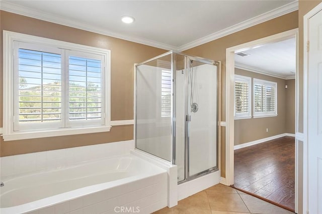 39766 Pinedale Way, Murrieta, CA 92562 - bathroom with a garden tub, a stall shower, ornamental molding, and tile patterned flooring