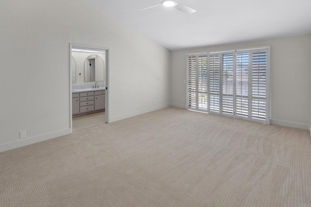 22 Seaview Dr S, Rolling Hills Estates, CA 90274 - empty room featuring a ceiling fan, light carpet, a sink, and baseboards