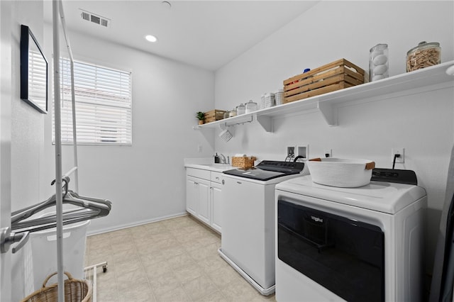 2851 Menorca Cir, Corona, CA 92881 - washroom with cabinet space, washer and clothes dryer, baseboards, and light floors