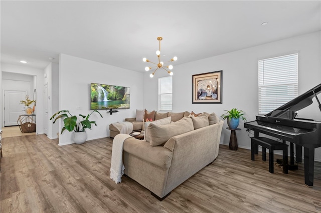 2851 Menorca Cir, Corona, CA 92881 - living room featuring wood finished floors, a chandelier, baseboards, and recessed lighting