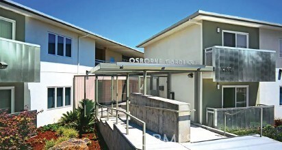12360 Osborne St, Pacoima, CA 91331 - back of property with stucco siding and a sunroom