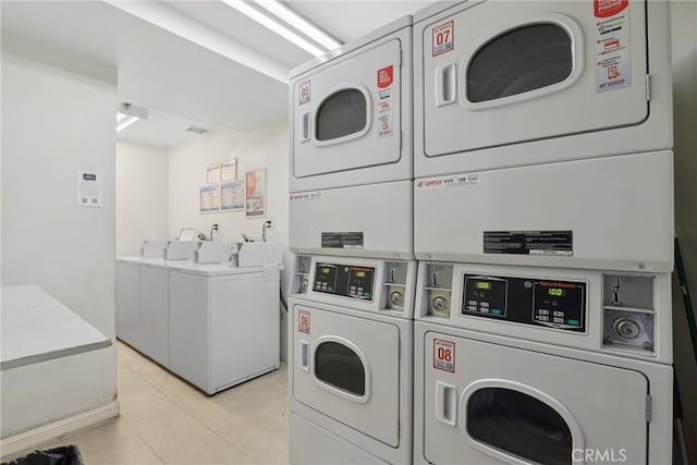 4401 Sepulveda Blvd Unit 112, Sherman Oaks, CA 91403 - communal laundry room with estacked washer and dryer, washer and clothes dryer, and light tile patterned floors