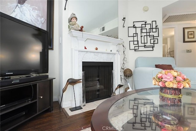 4401 Sepulveda Blvd Unit 112, Sherman Oaks, CA 91403 - living room featuring wood-type flooring and a high end fireplace