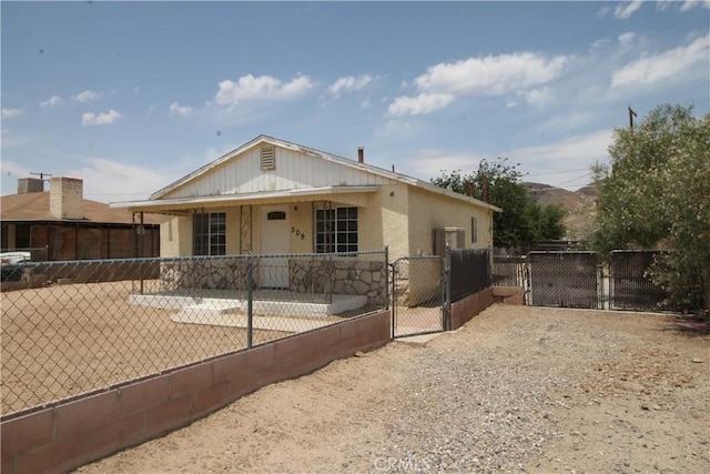 509 E Williams St, Yermo, CA 92398 - bungalow-style house featuring a gate and stucco siding