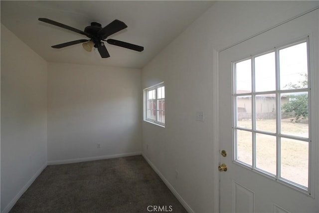 509 E Williams St, Yermo, CA 92398 - unfurnished room with baseboards, carpet flooring, and ceiling fan