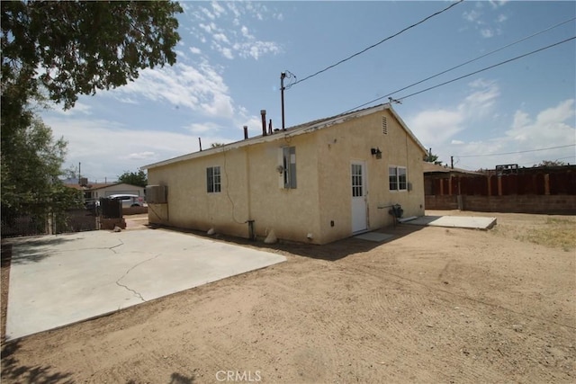 509 E Williams St, Yermo, CA 92398 - rear view of house featuring a patio and stucco siding