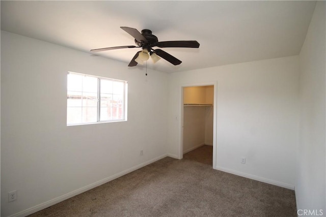 509 E Williams St, Yermo, CA 92398 - unfurnished bedroom with carpet floors, baseboards, a spacious closet, ceiling fan, and a closet